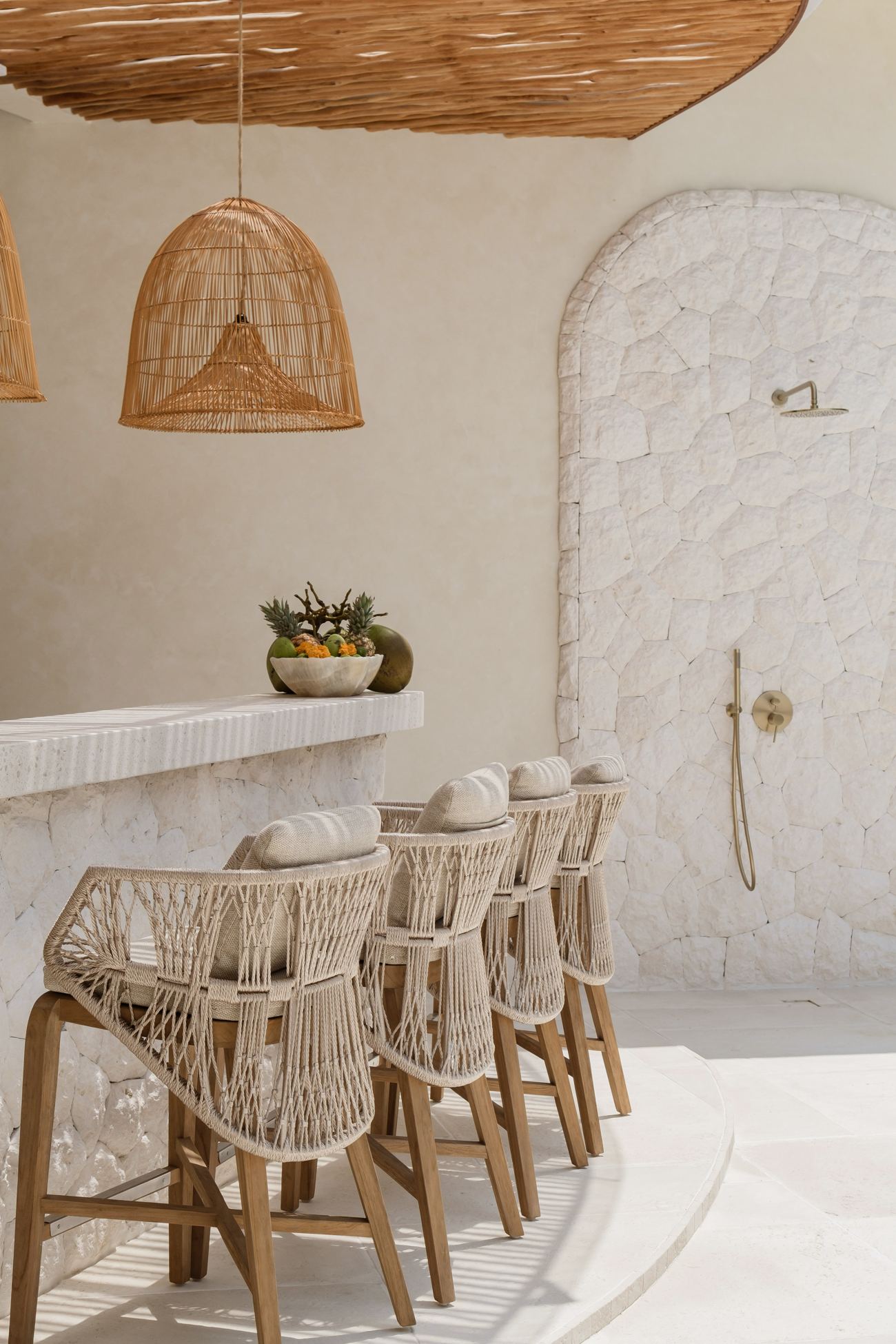 Outdoor bar with rattan stools at Villa Minati